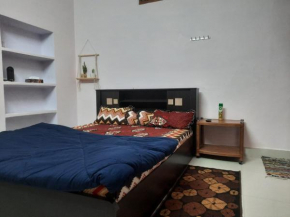 Private double bedded room with kitchen